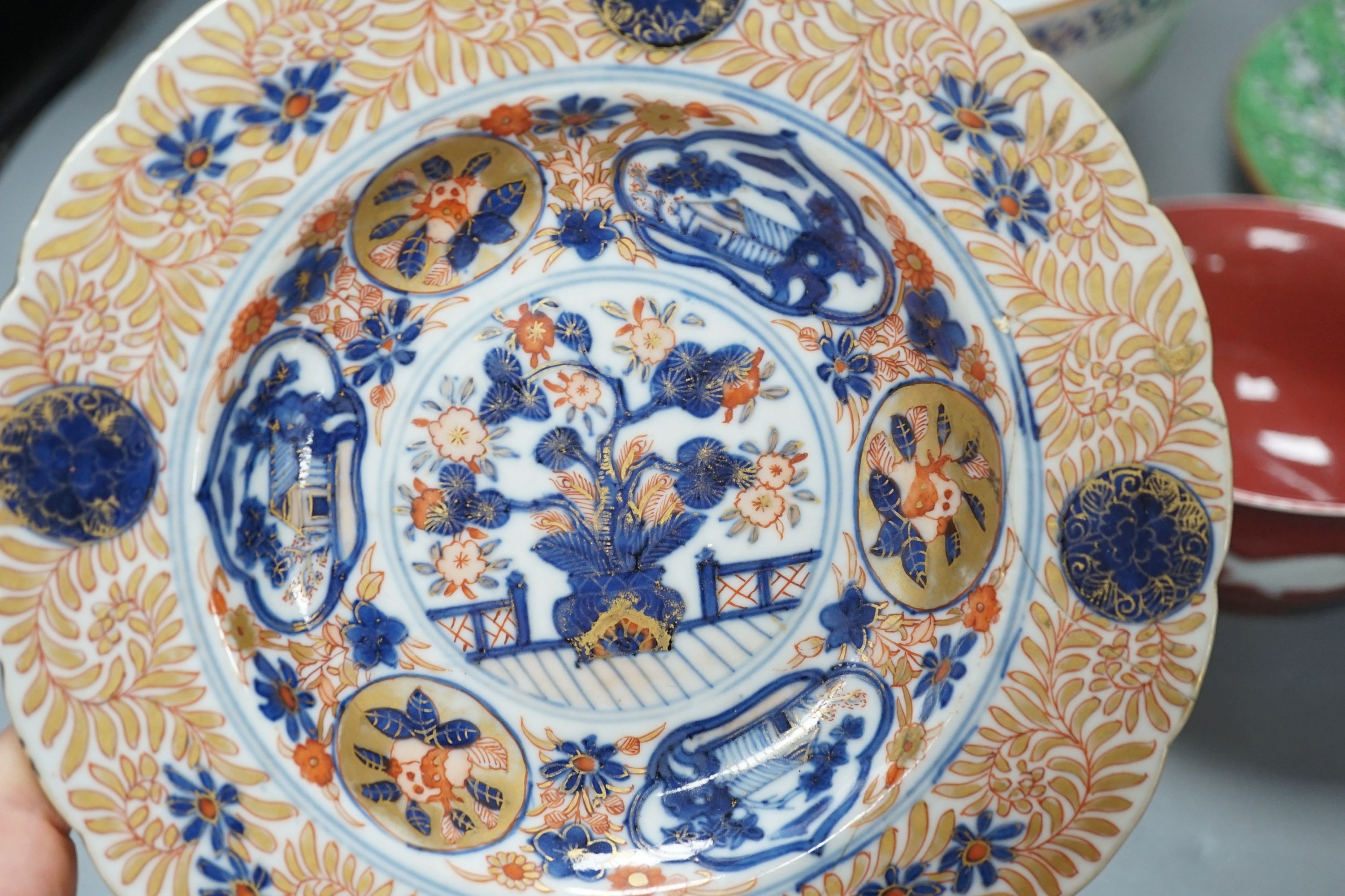 A Chinese Kangxi Imari dish, a blue and white dish, Qianlong famille rose bowl, a republic period plate and later sang de boeuf bowl